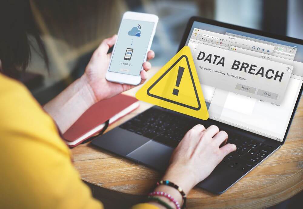 impacts of a data breach on your business on a computer
